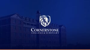 Blue-tinted campus building with a white Cornerstone College & Seminary lion crest logo centered above the institution name.