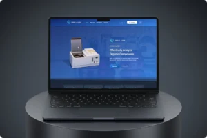 Laptop screen displaying a blue product page for Iatroscan MK7 with a lab instrument image and the headline 'Effectively Analyze Organic Compounds'.